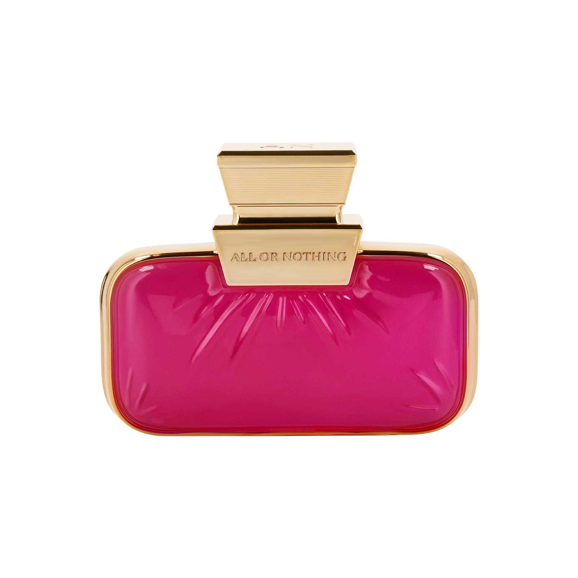 botol parfum berwarna pink dengan hiasan emas