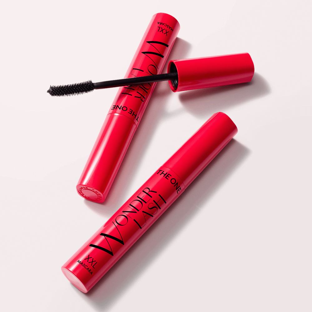 un tub roșu cu o perie neagră în interior