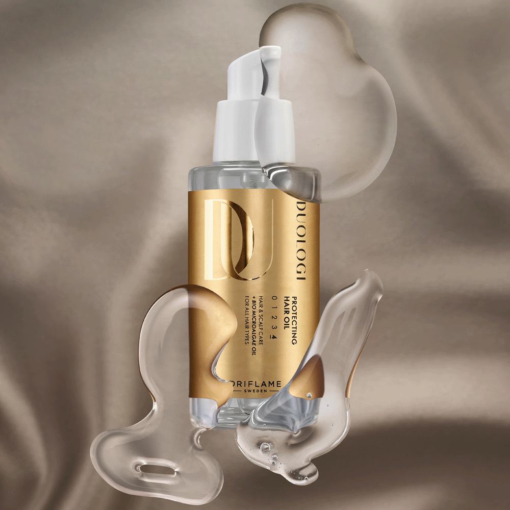 a bottle of liquid with a gold label