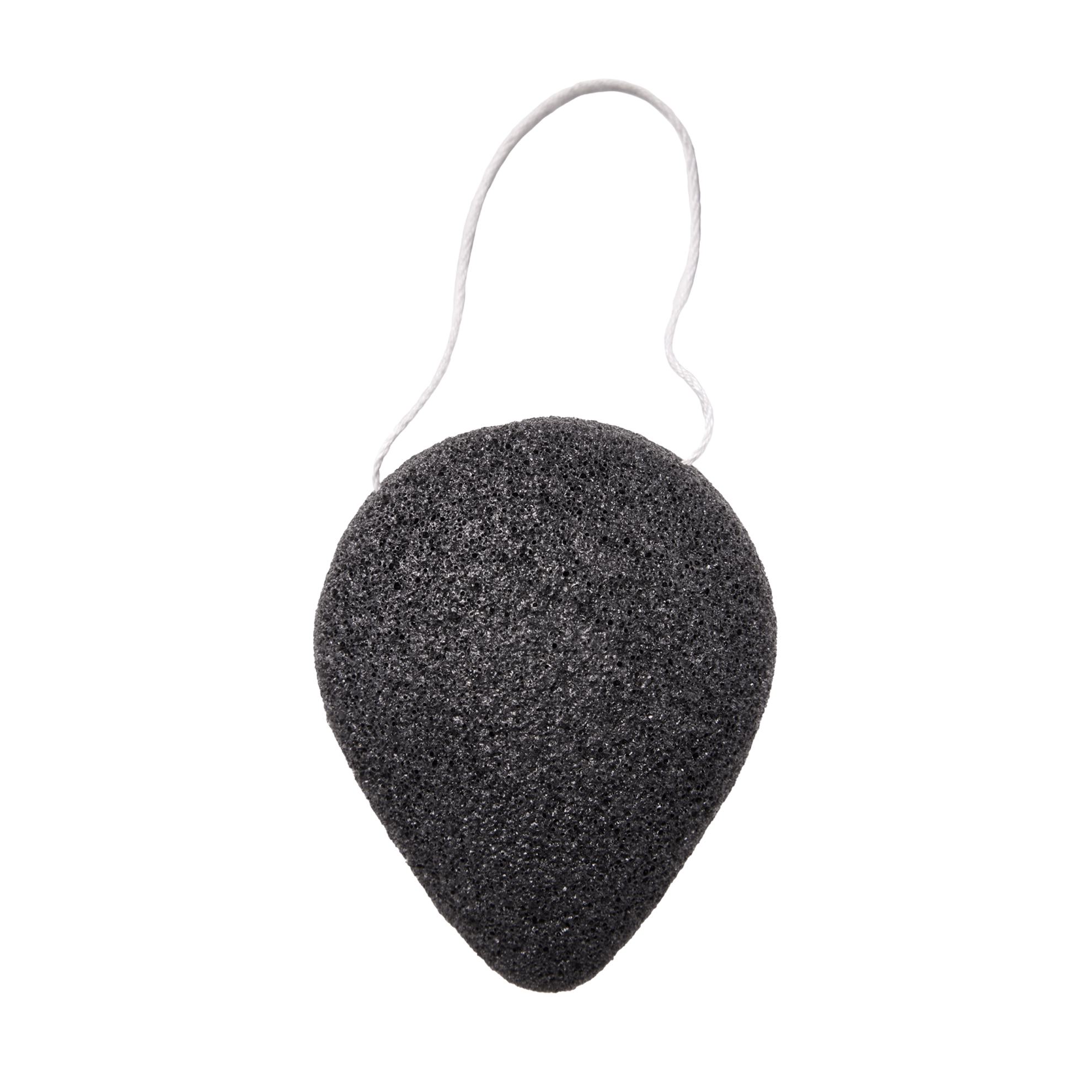 a black sponge with a white string
