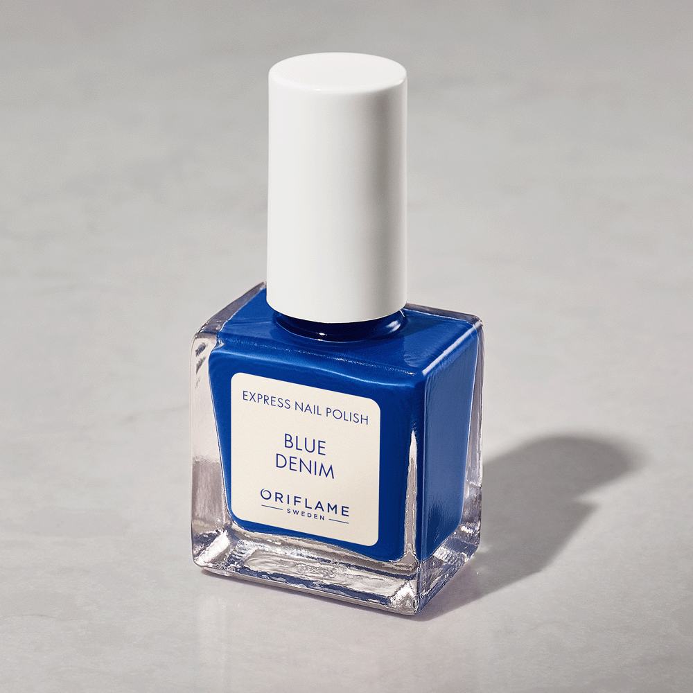 ένα μπλε μπουκάλι με λευκό καπάκι