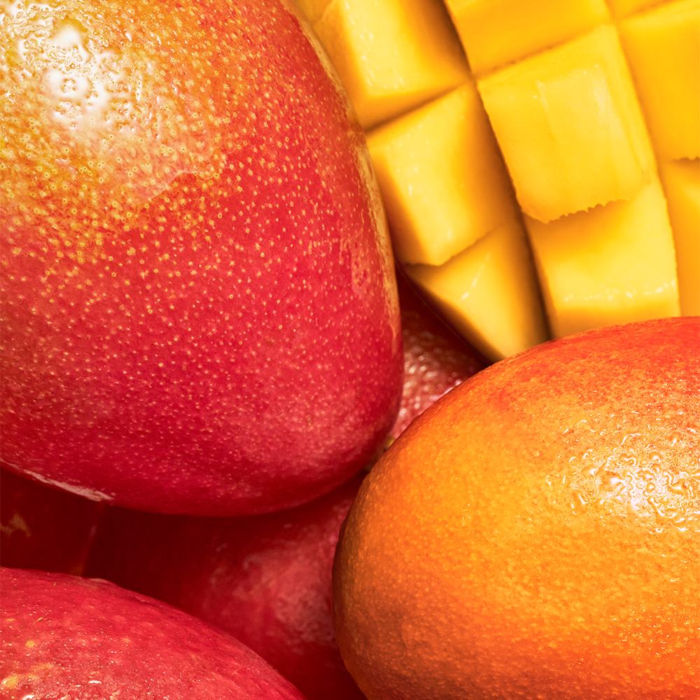 a group of mangoes and a mango cube