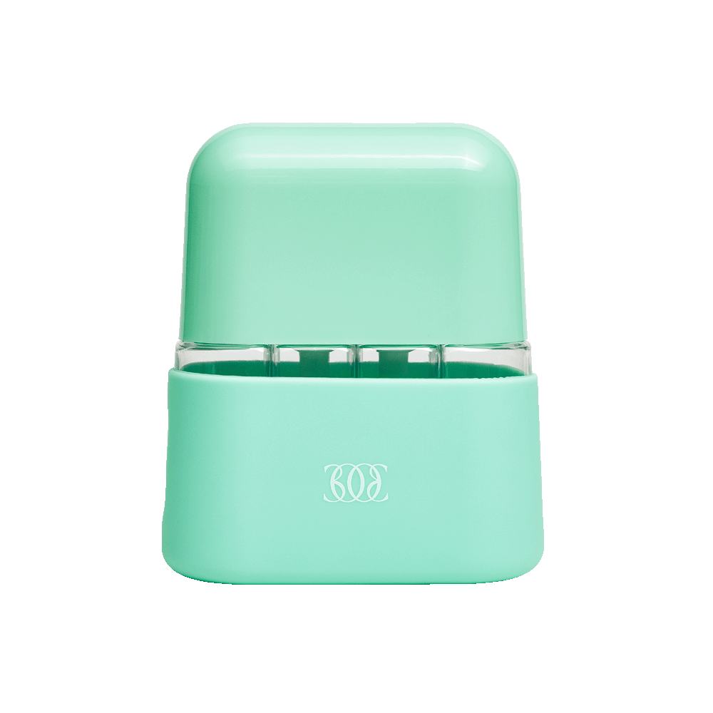 a green pencil sharpener