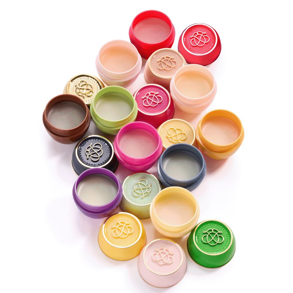 a group of small containers with different colors