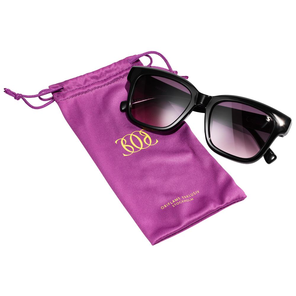 een zonnebril in een paars etui