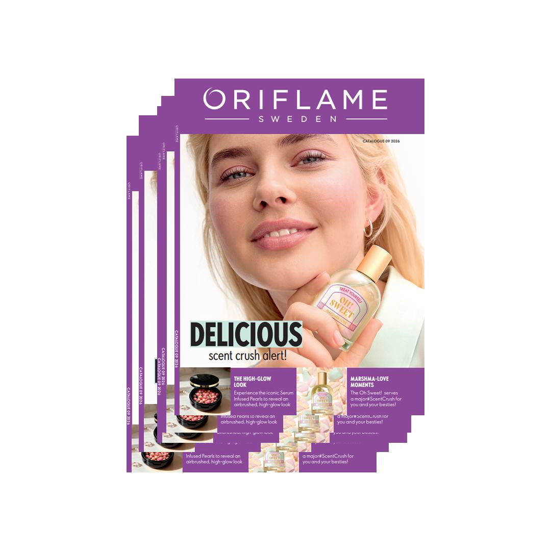 a magazine with a woman holding a bottle of perfume