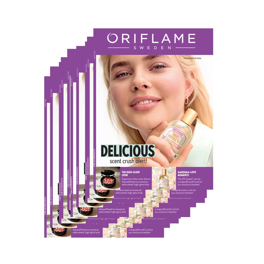 a magazine with a woman holding a bottle of perfume