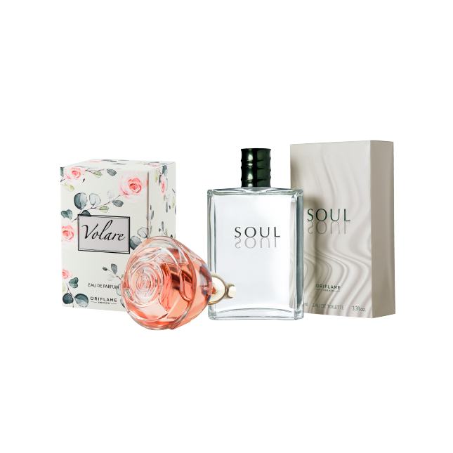 Una botella de perfume junto a una caja.