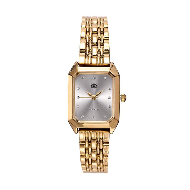 un reloj de oro con esfera plateada